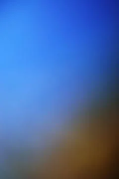 Abstract blue and brown gradient background with soft light transition Stock Photos