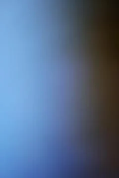 Abstract blue and brown gradient background with soft light transitions Stock Photos