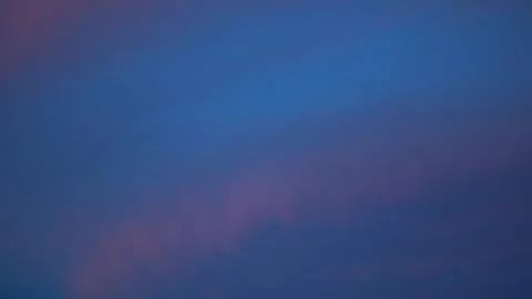 Abstract Blue and Pink Cloudscape Background Stock Photos