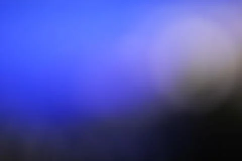 Abstract blue and purple gradient background with soft light bokeh effect Stock Photos