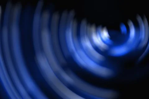 Abstract blue background , blurred circle on the black background Stock Photos