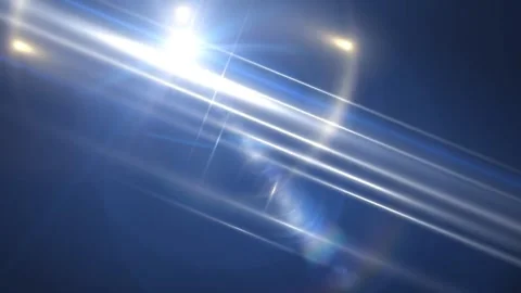 Abstract Blue Background with Diagonal Light Rays and Lens Flare Effects Stock Footage 297014647