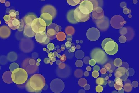 Abstract blue background with glowing circular bokeh and soft bubbles pattern Illustrazione stock