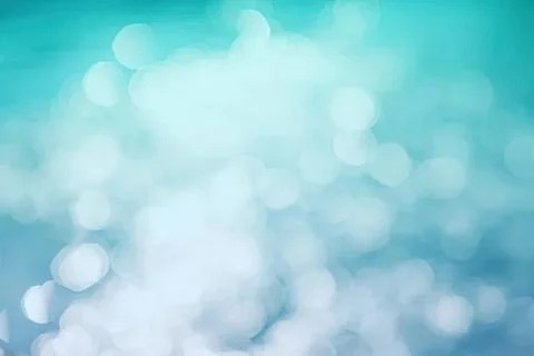 Abstract blue bokeh background with light circles and soft glow Stock Photos