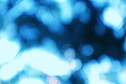 Abstract blue bokeh background with soft light and blurred effect Stock Photos
