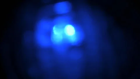 Abstract Blue Bokeh Light Leak With Right Rotating Movement On Dark Ground Stock Footage 330198107