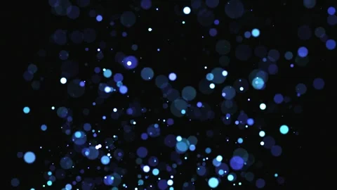 Abstract blue bokeh light particles floating on a dark background Stock Footage 312814767