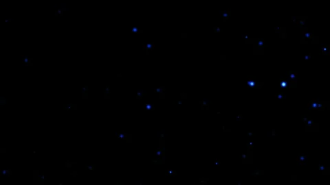 Abstract blue bokeh particles flow on black background Stock Footage 282752973