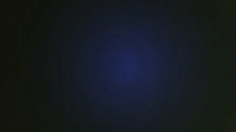 Abstract blue circle expands with glowing particles, creating a dynamic visual Stock Footage 326723516