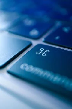 Abstract blue command button macro view. Technology, communication and busine Stock Photos