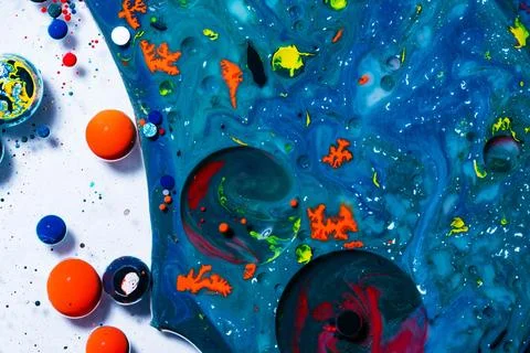 Abstract Blue Fluid Art Background with Vibrant Orange and Neon Paint Details Stock Photos