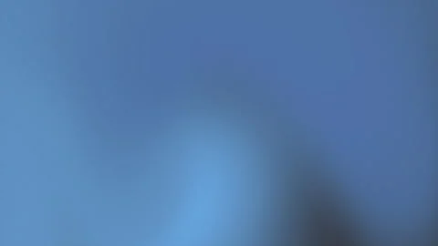 Abstract blue gradient background with soft light effect and subtle motion Stock Footage 339699737
