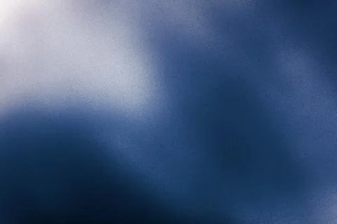 Abstract blue grainy texture creating gradient background Stock Photos