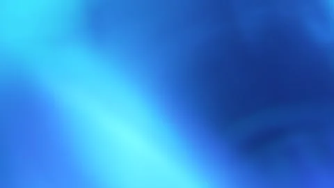 Abstract blue light leak texture background against a dark backdrop. Video stock 342796902
