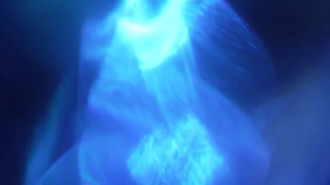 Abstract blue light leak texture background against a dark backdrop. Stock Footage 342797414