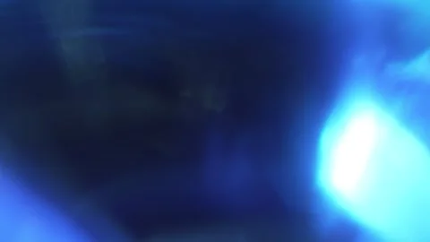 Abstract blue light leak texture background against a dark backdrop. Stock Footage 342805212