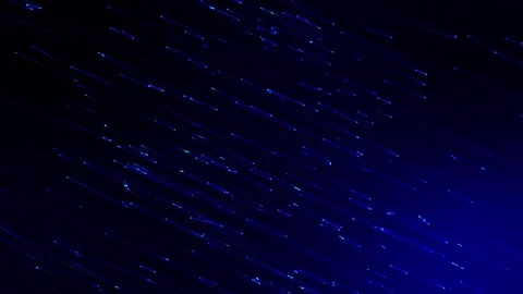 Abstract blue light particle motion on b... | Stock Video | Pond5