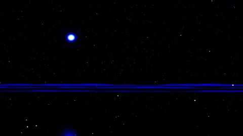 Abstract blue light particles moving across a dark starry background with h.. Video stock 346747965