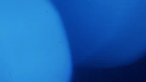 Abstract blue light patches that appear rhythmically Stock Footage 166345327