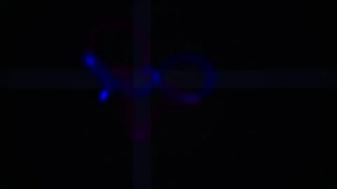 Abstract Blue Light Trails Form a Mysterious Figure in Darkness. Stock Footage 333909638