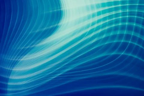 Abstract blue light waves forming curved lines with soft motion Stock Photos
