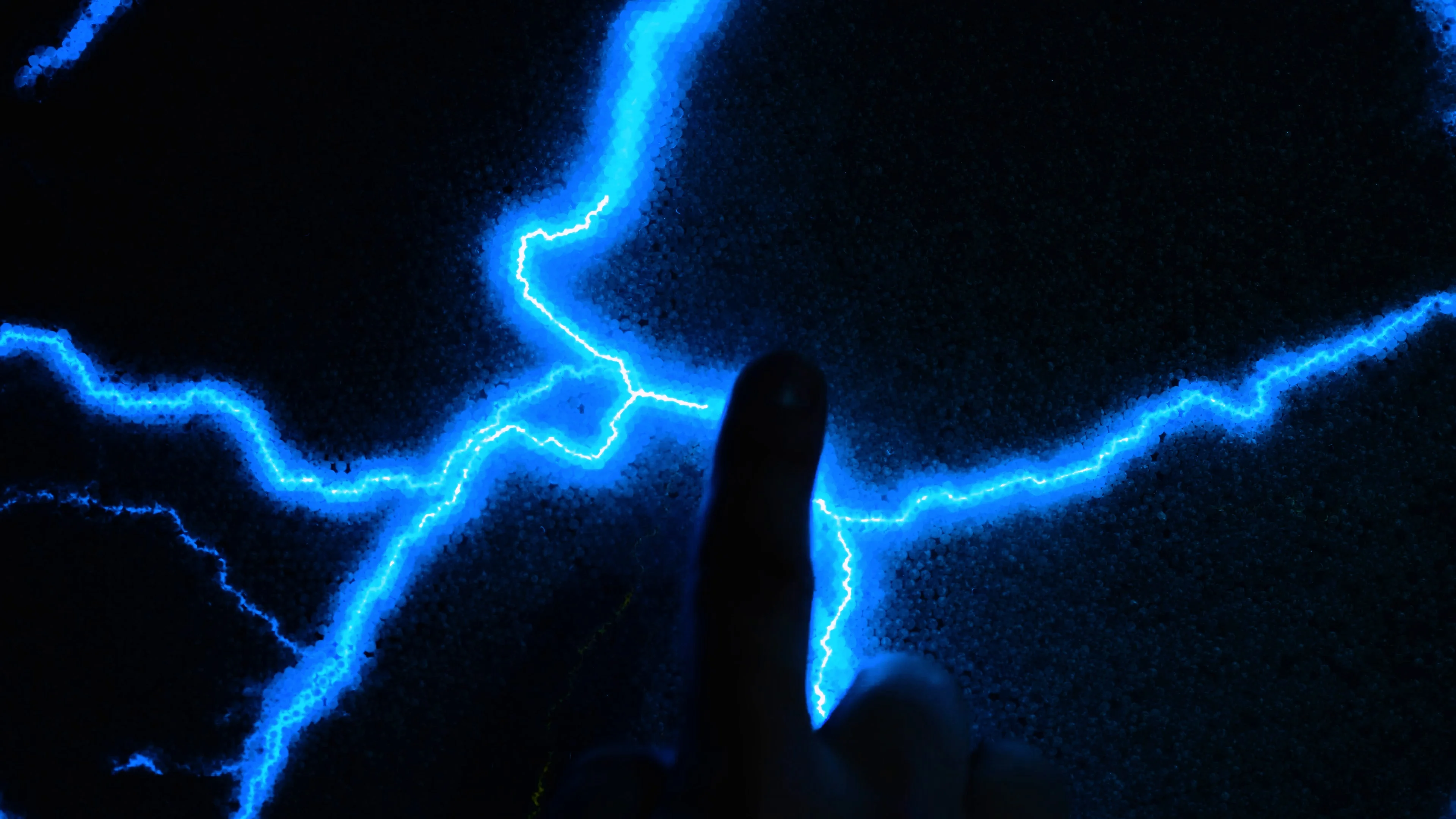 Abstract blue lightning. A man touches h... | Stock Video | Pond5