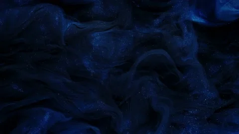 Abstract Blue Liquid Paints with Glitter Fumes in Beautiful Swirls Stock Footage 239234423