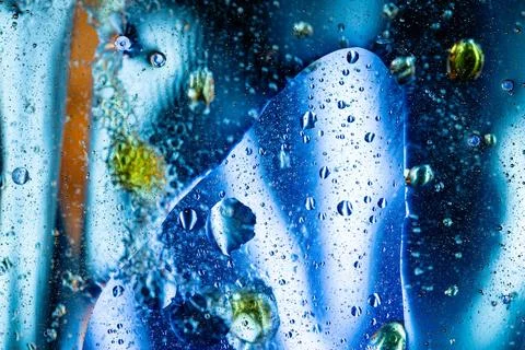 Abstract blue liquid texture with overlapping transparent bubbles macro Stock Photos