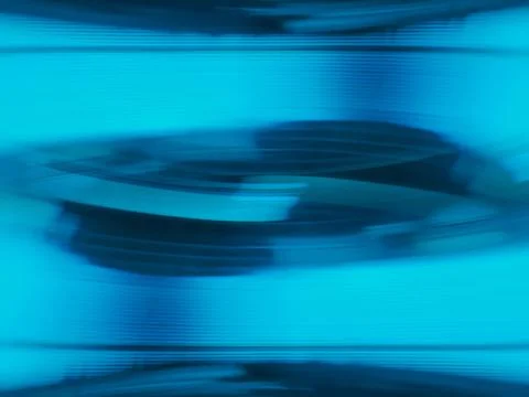 Abstract Blue Motion Blur Background With Circular Light Trails Evoking Tec.. Stock-Fotos