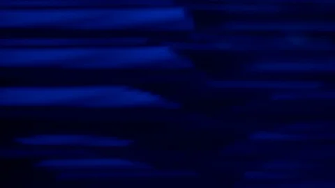 Abstract blue moving bokeh on a black background Vidéo 73876928