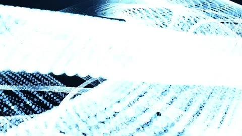 Abstract blue particle waves and flowing light lines form a dynamic digital b Stock Footage 327808467