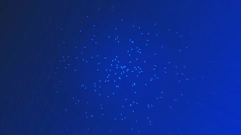 Abstract Blue Particles Expanding in Dark Space with Subtle Motion and Ligh.. Stock Footage 340045389