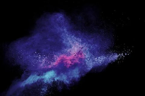 Abstract blue-pink dust explosion on black background. 스톡 일러스트