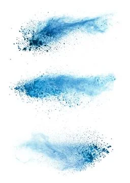 Abstract blue powder explosion isolated on white background. Stock Photos