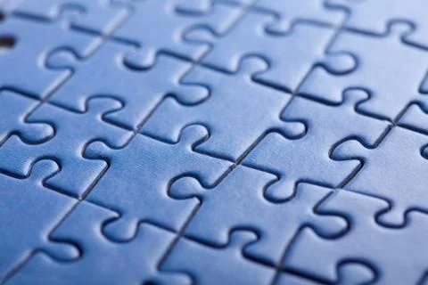 Abstract blue puzzle background Stock Photos