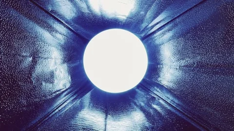 Abstract blue reflective tunnel opening to glowing circular light with futuristi Stock Footage 327729426
