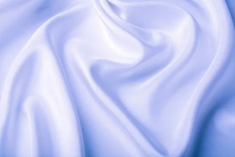 Abstract blue silk background Stock Photos