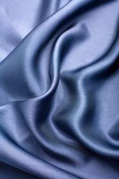 Abstract blue silk background Stock Photos