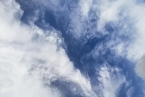 Abstract blue sky background with cirrus clouds Stock Photos