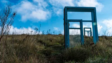 Abstract blue sky background with two window on the autumn fields. Conceptual Stock Photos