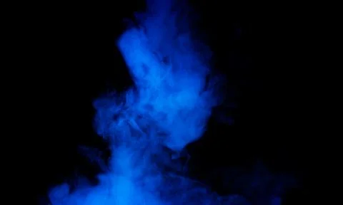 Abstract Blue Smoke Cloud on Black Background with Glowing Vapor Effect Stock Photos