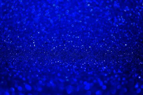 Abstract blue texture glitter lights background. de-focused. Stock Photos