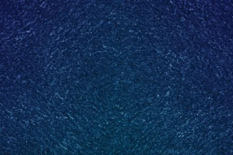 Abstract blue texture resembling brush strokes with gradient effects Stock Illustration