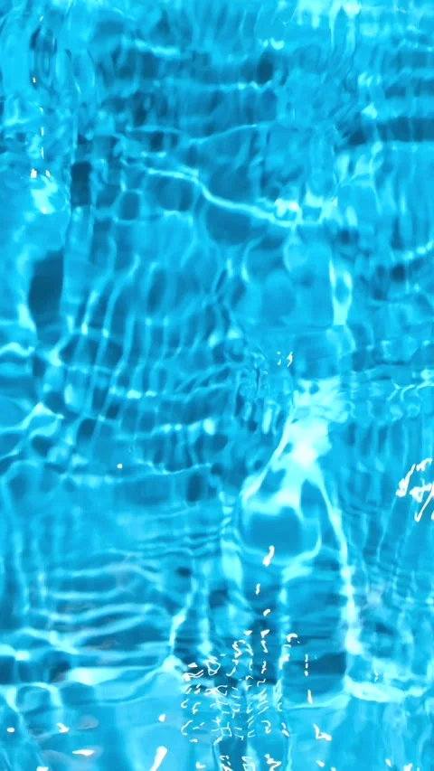 Abstract blue water surface background with gentle waves and copy space in slow  Stock Footage 343004870