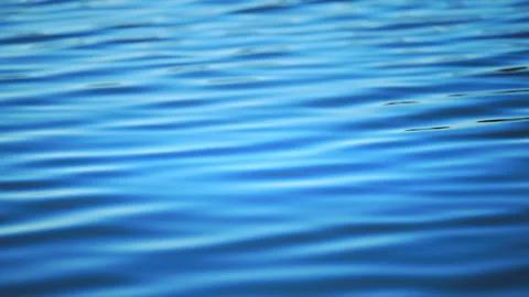 Abstract blue water surface with smooth waves, peaceful 4K slow motion Stock Footage 326339211