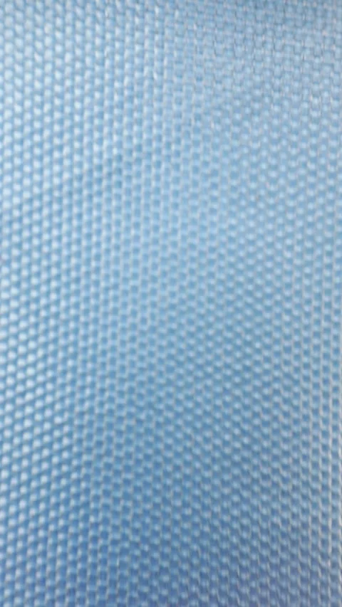 Abstract Blue Woven Fabric Texture Macro with Subtle Motion and Flow Pattern Stock Footage 332777940