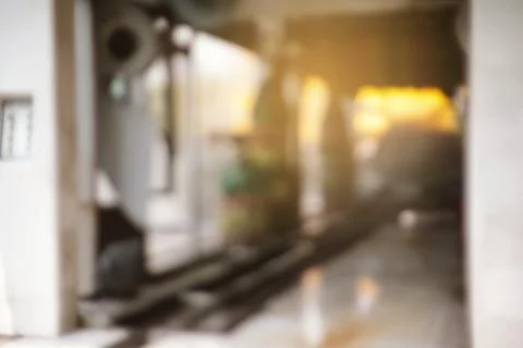 Abstract blur and defocused automatic carwash machine at car care center Stock Photos