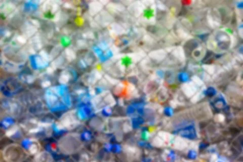 Abstract blur background Plastic bottle in cage Stock Photos
