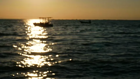 Abstract blur background. silhouette of small boat over the sea Stock Footage 134333748