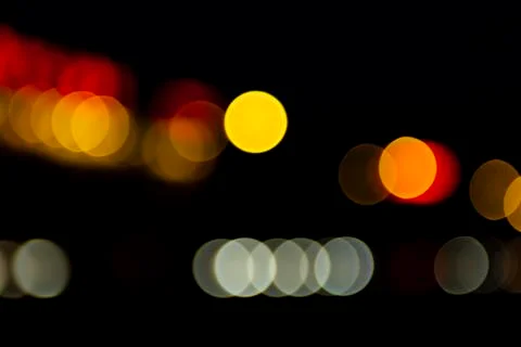 Abstract blur bokeh light background on a city street Stock Photos